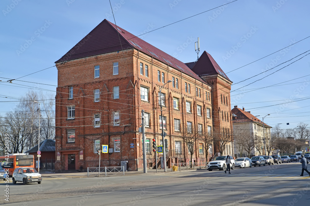 Fototapeta premium KALININGRAD, RUSSIA - MARCH 09, 2021: Brick building of the barracks of the 3rd Cuirassier Count Wrangel Regiment (1870)