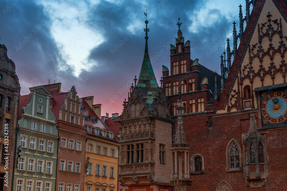 beautiful sunset in the background of the old district of wroclaw poland