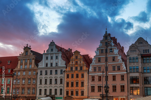 beautiful sunset in the background of the old district of wroclaw poland