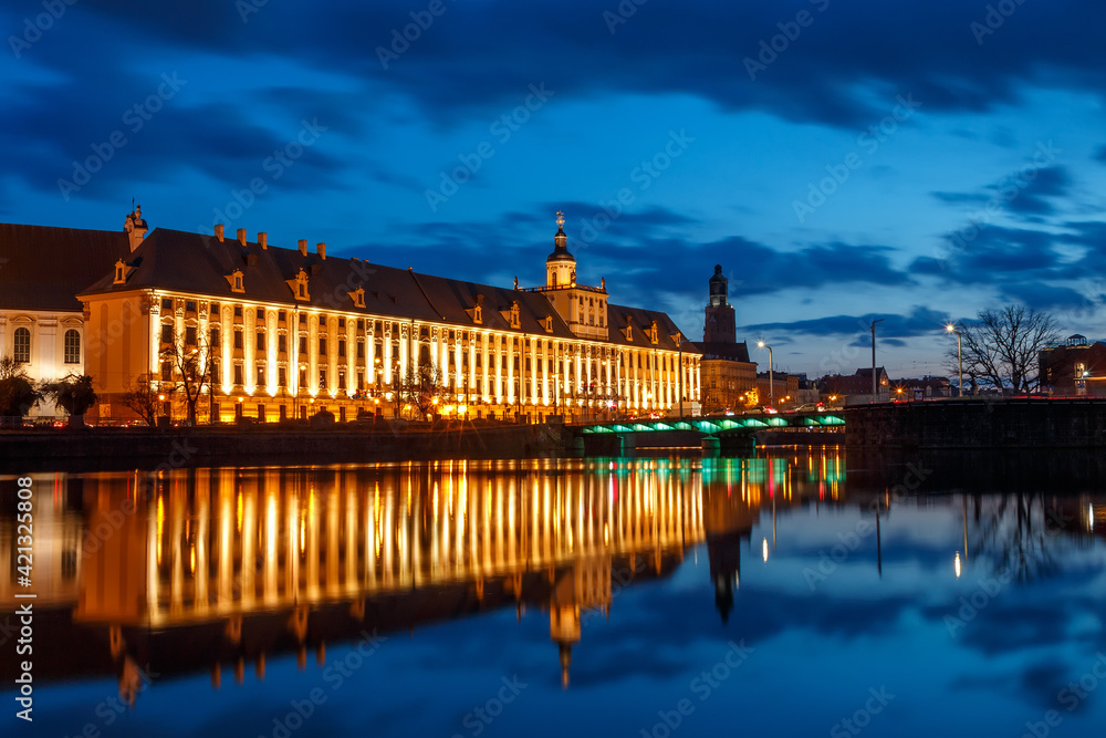 night view of the river and the old districts of the city of wroclaw in poland