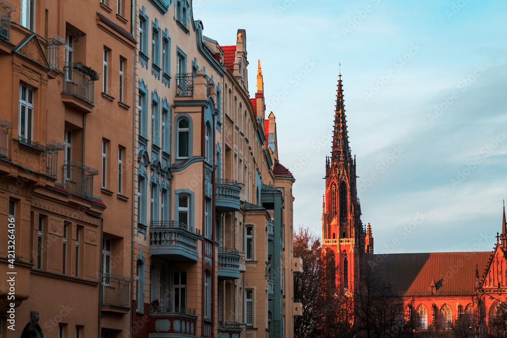 view of the beautiful evening street of wroclaw with a tower in poland