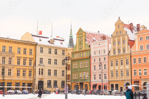 winter daytime snowy old buildings of wroclaw city in poland