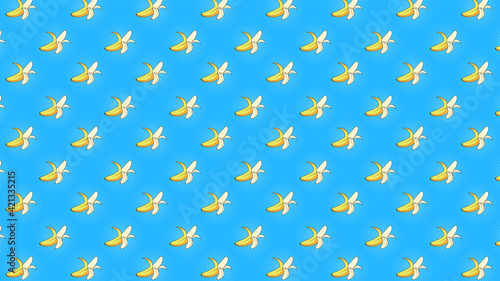 ripe peeled bananas pattern on a blue background in pop art style © Tatsiana
