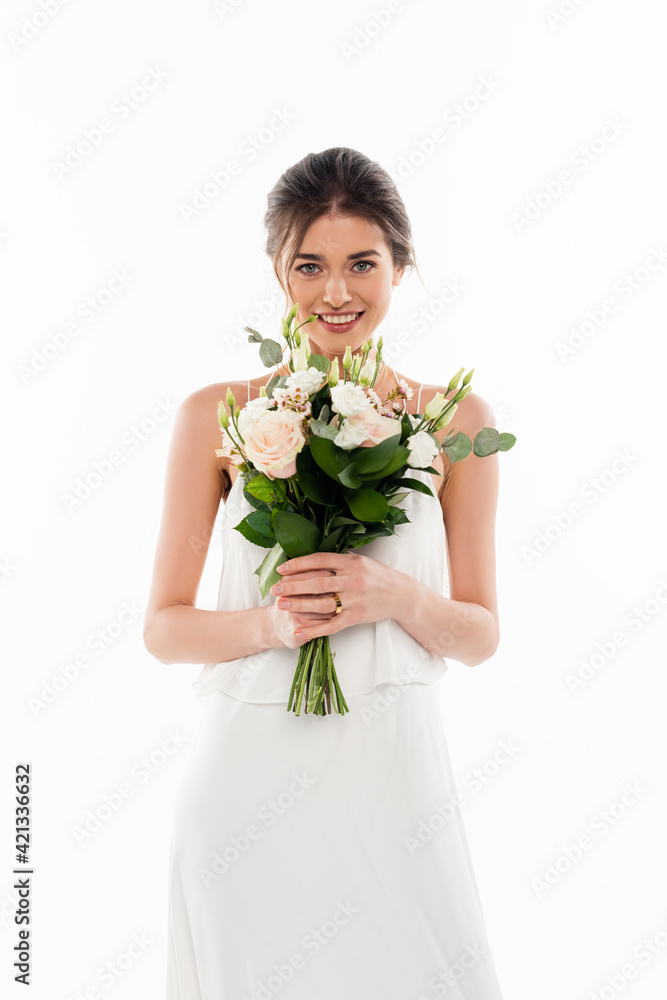 cheerful woman in wedding dress holding bouquet isolated on white cheerful woman in wedding dress holding bouquet isolated on white