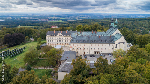 A magnificent monastery with a basilica and a sanctuary on St. Anne's Mountain, a place of Christian worship in Poland in the province Silesia, aerial photos © konradkerker