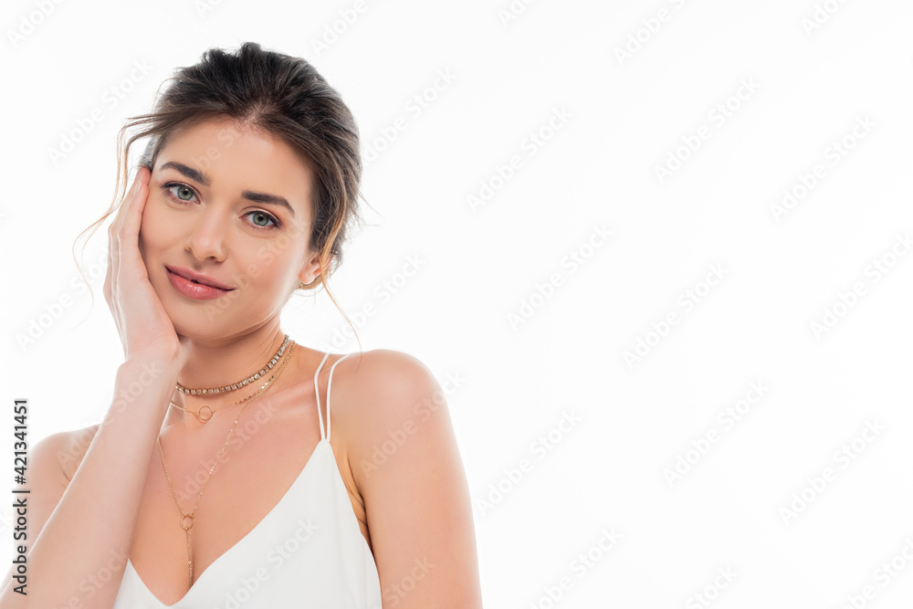 smiling bride looking at camera and touching face isolated on white smiling bride looking at camera and touching face isolated on white