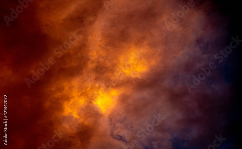 Dramatic sky with red clouds at dusk