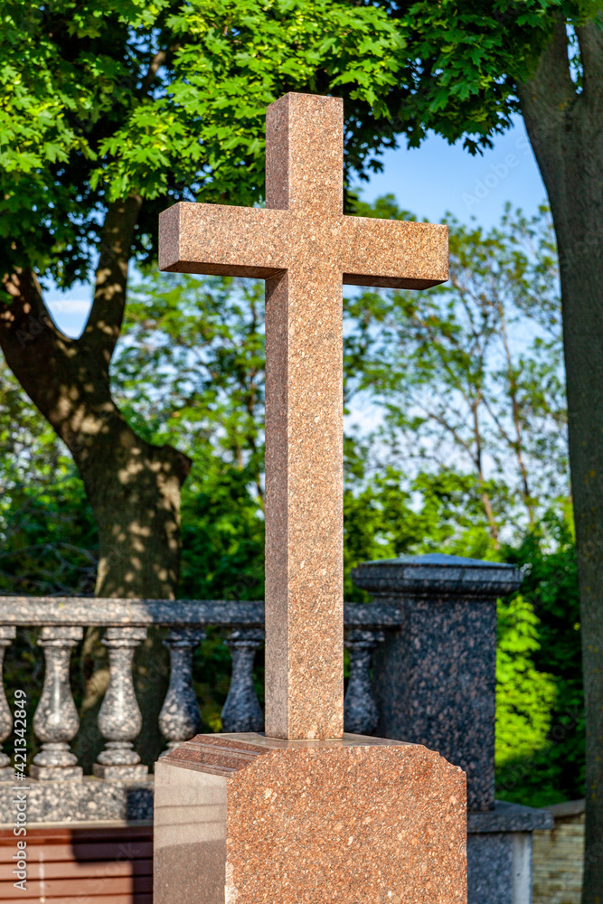 Ukraine, Kyiv - May 7, 2019: religious cross monument of metal and stone