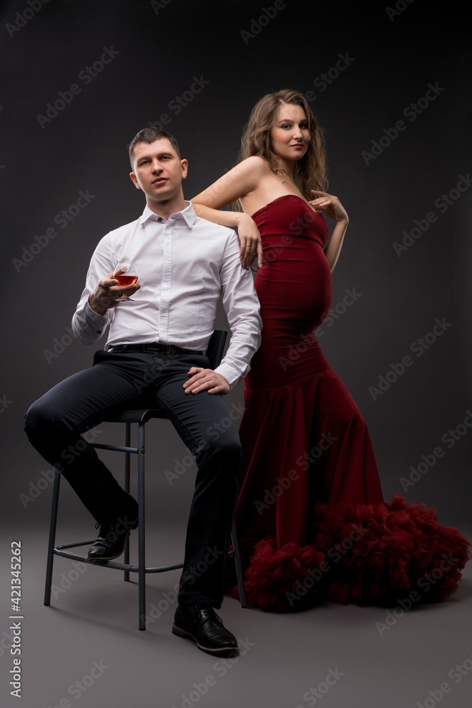 Stylish couple in elegant clothes in studio Stylish couple in elegant clothes in studio