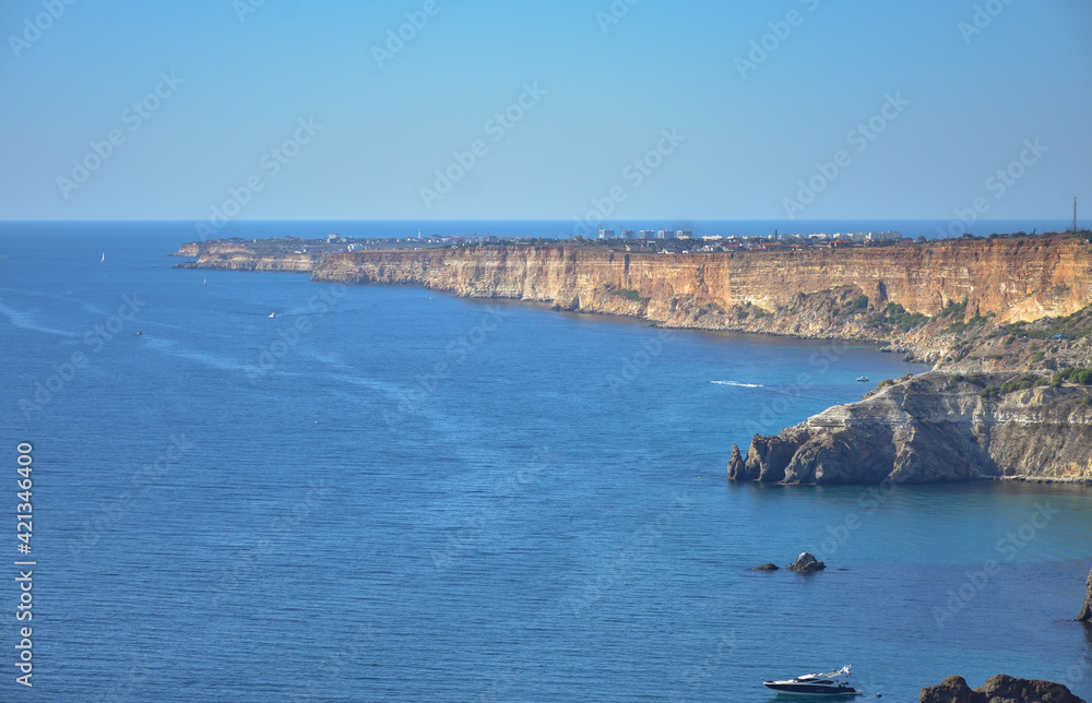 Cape Fiolent. Beautiful views of the Black Sea coast at Cape Fiolent in summer in clear weather. Aerial view to beautiful sea coast with turquoise water and rocks