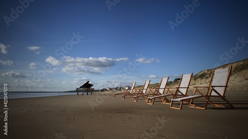 Piano and Beach Chairs on the Shore 3D Illustration