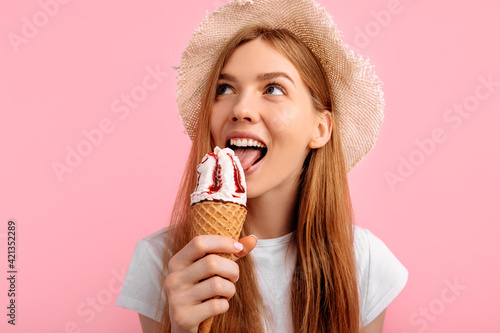 Thinking, young woman, with delicious ice cream on a pink background