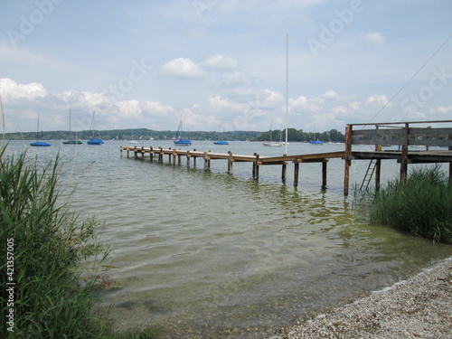 German Boat Dock on the Ammersee Near Herschel, Germany, where the Lake Ferry Boards Passengers on the Trip around the Lake photo