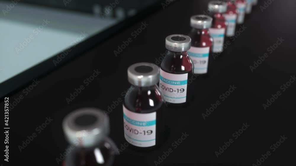 Coronavirus vaccine in ampoules on the production line. 4K Coronavirus vaccine in ampoules on the production line. 4K