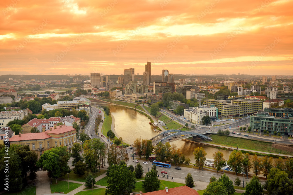 Beautiful panorama of Vilnius old town taken from the Gediminas hill. Nice sunny sunset in Lithuania's capital.