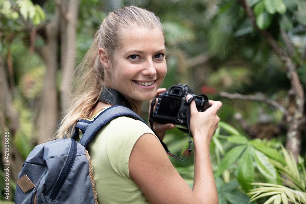 professional woman photographer taking camera outdoors professional woman photographer taking camera outdoors