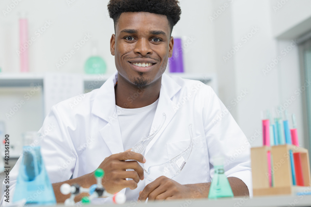 portrait of a happy lab technician portrait of a happy lab technician