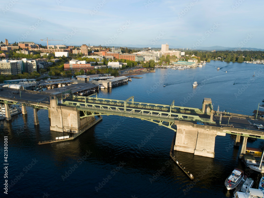 Aerial view of Portage Bay with the University Bridge in the foreground and the University of Washington in the background.