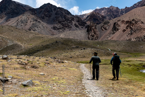 father and son traveling in the mountains