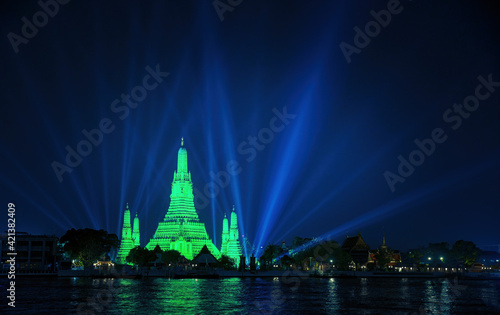 Wat Arun in green to celebrate St. Patrick's Day 2021, Bangkok Thailand