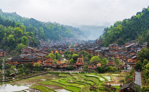 Night view of Dong Village in Zhaoxing, Guizhou, China photo