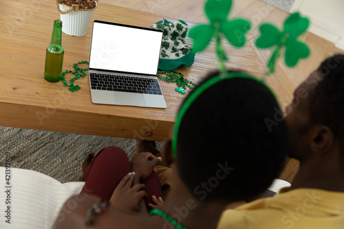 African american couple wearing st patrick's day costumes making a video call