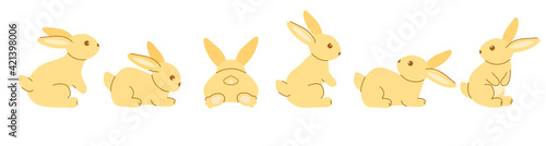 A set of cute yellow rabbits. Six colored sitting and recumbent bunnies on a white background. Festive Easter bunnies. Vector illustration