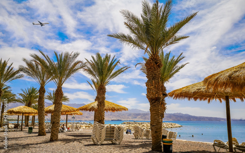 Morning on sandy beach in Eilat - famous tourist resort and recreation city i...