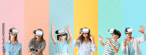 Different people with virtual reality glasses on color background photo