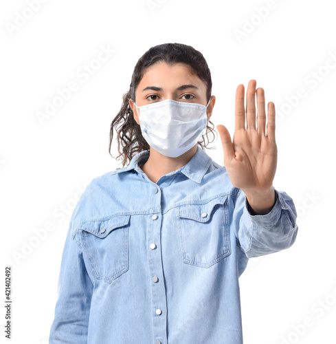 Young woman in medical mask...