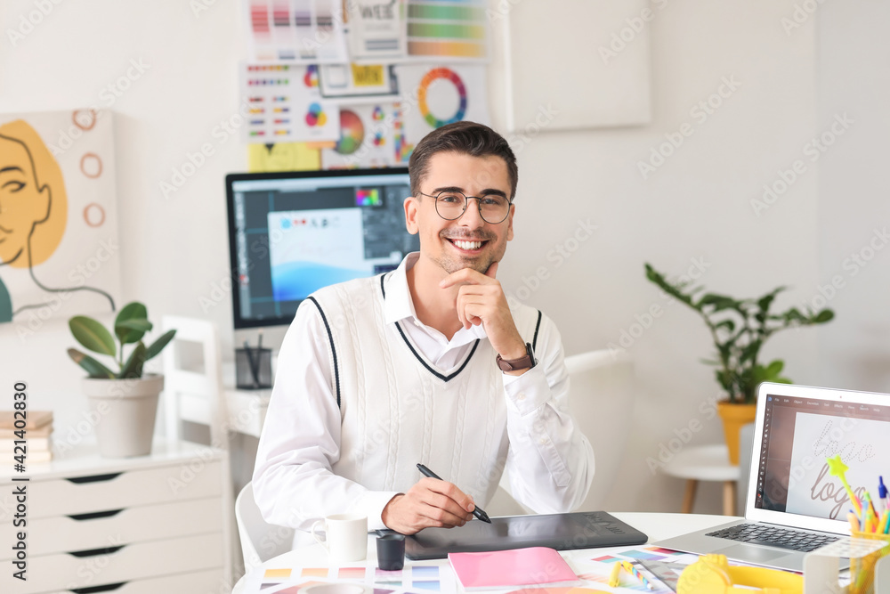 Graphic designer working in office Graphic designer working in office