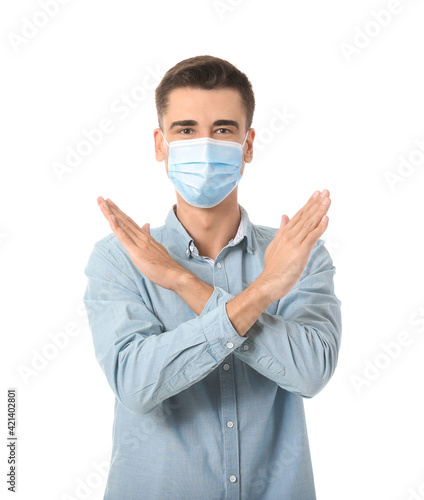 Young man in medical mask s...
