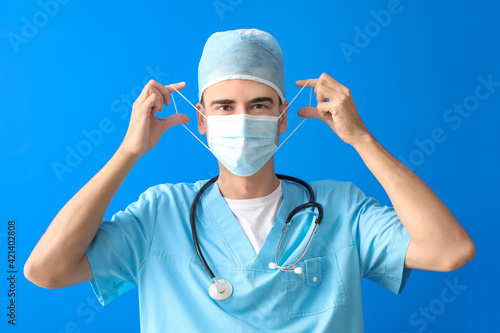 Male doctor in medical mask...