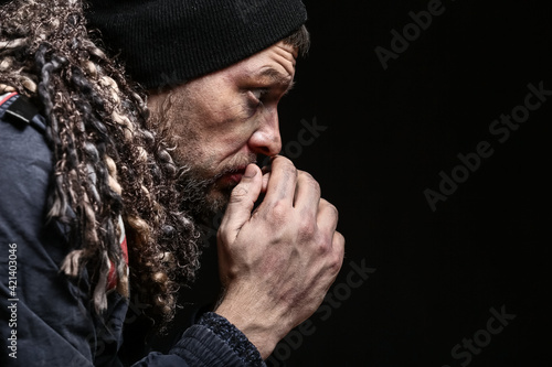 Portrait of poor homeless m...