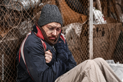 Poor homeless man outdoors ...