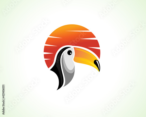 elegant toucan head bird sun background logo icon symbol design illustration inspiration