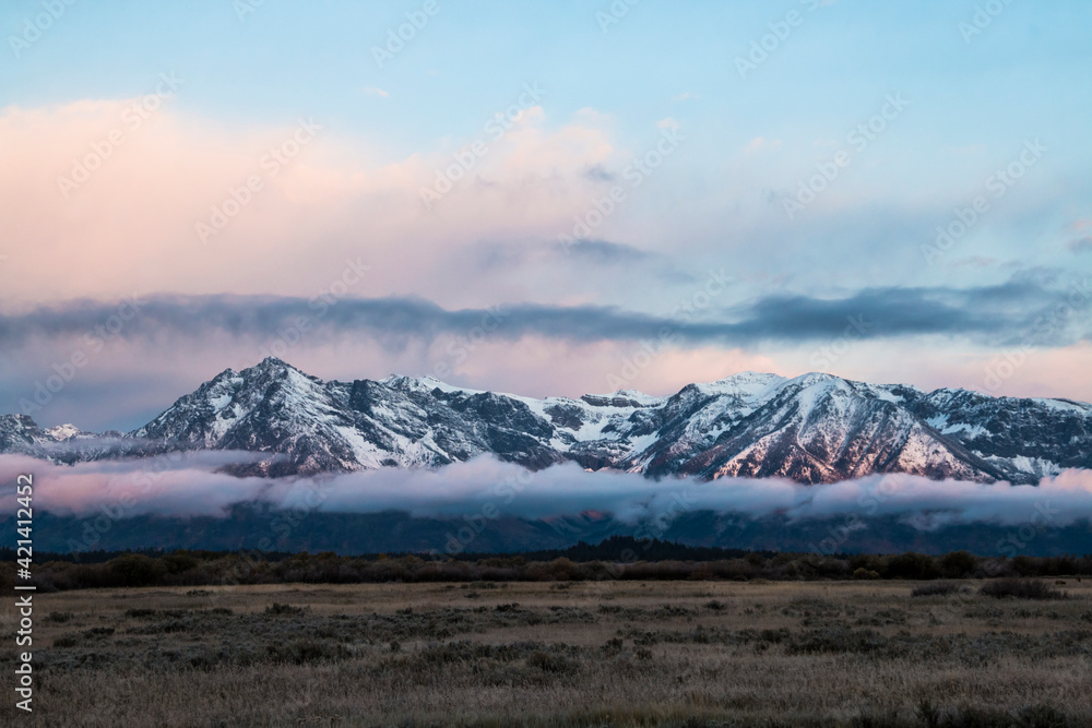 dramatic snowcapped mountain landscape in the Grand Tetons National Park in Wyoming. dramatic snowcapped mountain landscape in the Grand Tetons National Park in Wyoming.