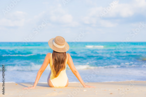 Portrait beautiful young asian woman relax smile leisure around beach sea ocean