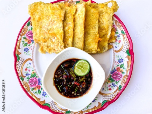 fried tempeh with spicy soy sauce. photo