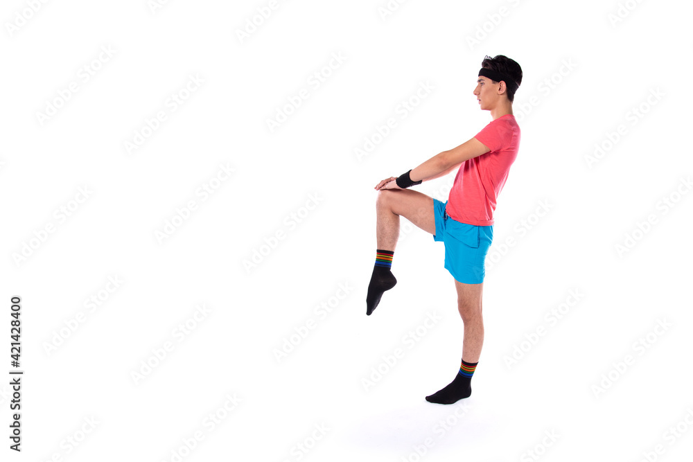 A young guy in shorts and a T-shirt goes in for sports and fitness. Retro style. 80s, 90s, 70s. Isolate. White background. A young guy in shorts and a T-shirt goes in for sports and fitness. Retro style. 80s, 90s, 70s. Isolate. White background.
