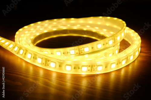 glowing with warm light LED strip close-up