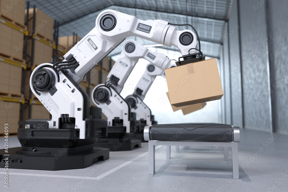 Fototapeta premium The Robot arm picks up the cardboard box in the warehouse, Automation robot arm in the storehouse