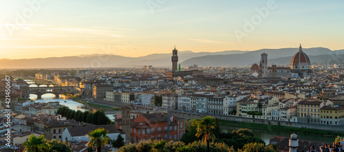 Florence or Firenze sunset aerial cityscape. Panorama view from Michelangelo park square. Ponte Vecchio bridge  Palazzo Vecchio and Duomo Cathedral. Tuscany  Italy