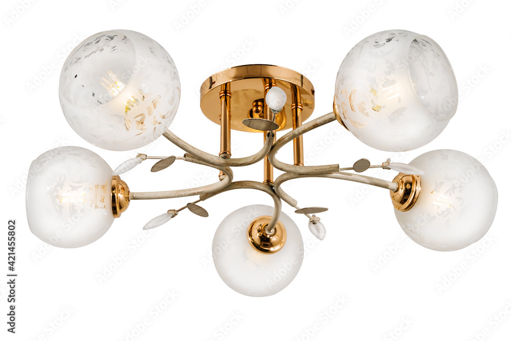 White five-lamp chandelier with a golden base and white matte shades with floral ornaments. Isolated on white background