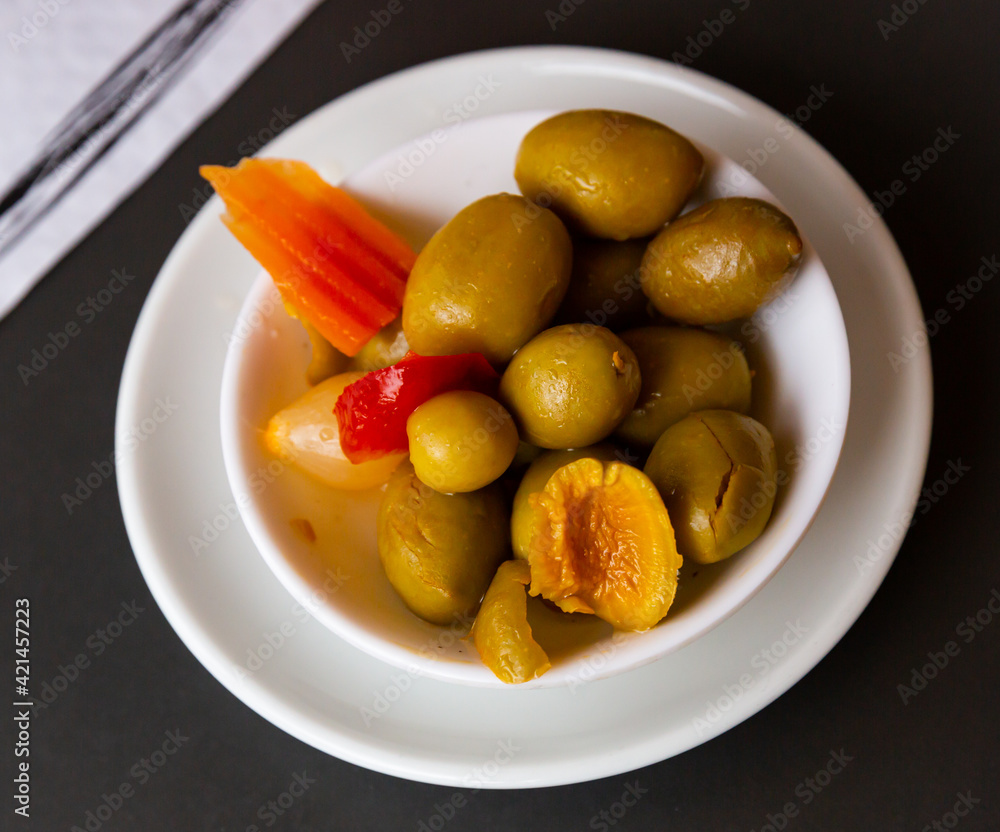 Marinated olives with pits - typical Spanish tapas