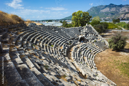 Ruins of Theatre in Letoon Ancient City in village Kumluova  Turkey. Sunny day  Greek culture ancient amphitheater architecture