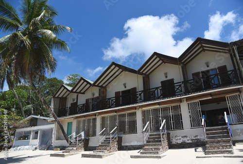 Canvas Print Houses on tropical beach, tourism accommodation concept.