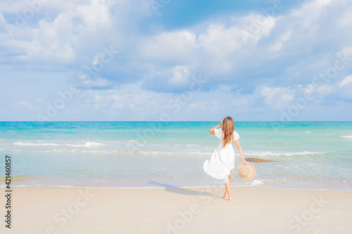 Portrait beautiful young asian woman relax smile leisure around beach sea ocean