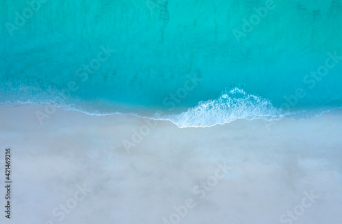 Aerial top view of Summer beach with sandy sea landscape with turquoise water background