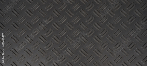 Top view of anthracite gray grey aluminium checker plate texture background banner panorama